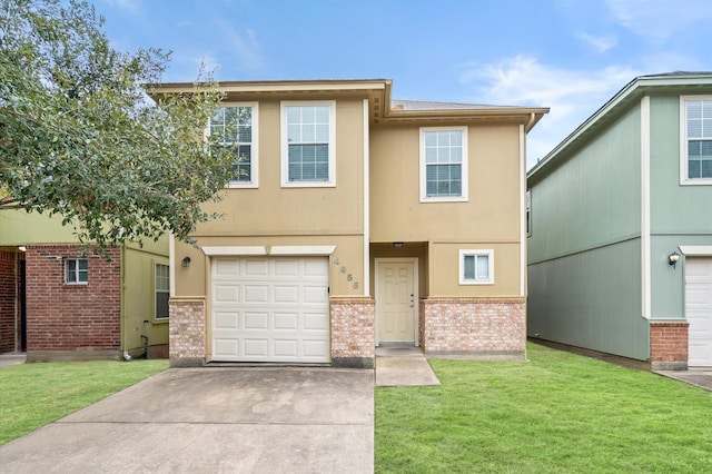 view of front of property with brick siding, a garage, concrete driveway, a front lawn, and stucco siding