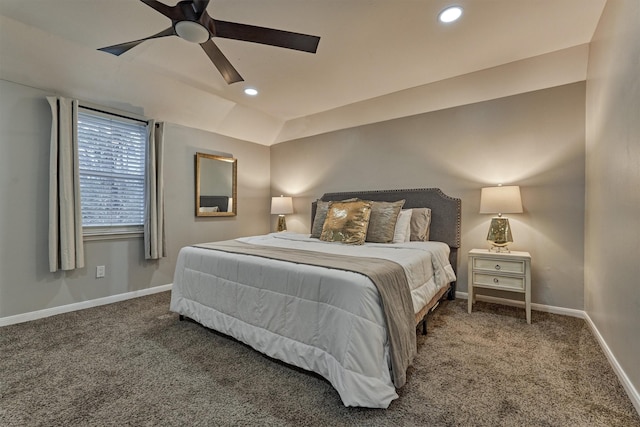 carpeted bedroom with ceiling fan and lofted ceiling