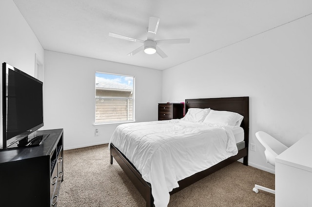 bedroom featuring carpet floors, baseboards, and a ceiling fan