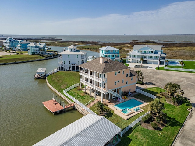 bird's eye view with a water view