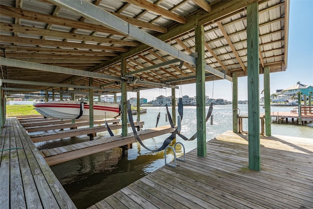 dock area featuring a water view