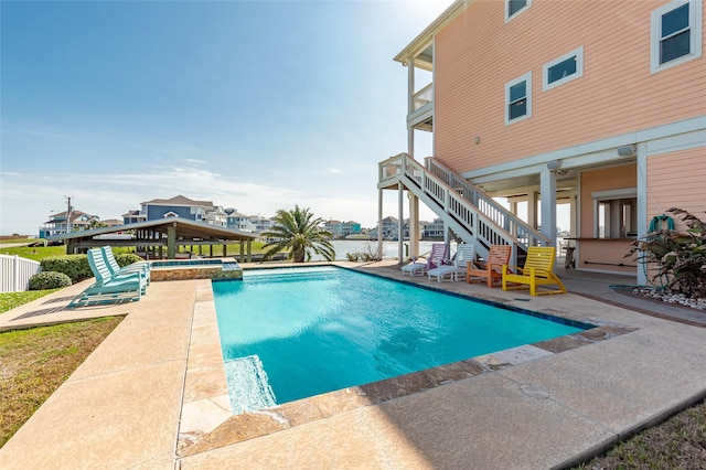 view of swimming pool featuring a patio area