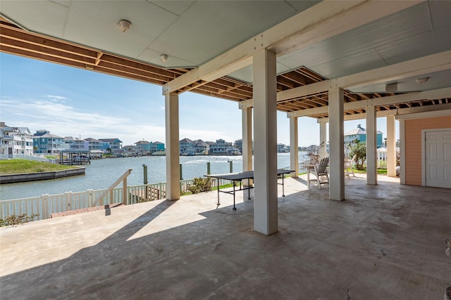 view of patio / terrace with a water view