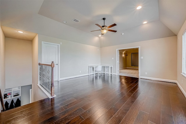 interior space featuring lofted ceiling, dark hardwood / wood-style floors, and ceiling fan