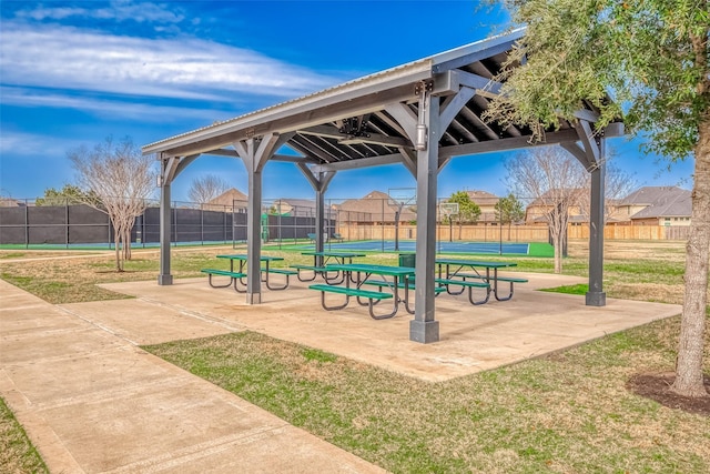 view of property's community with a yard