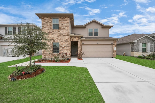 view of front of property with a garage and a front lawn