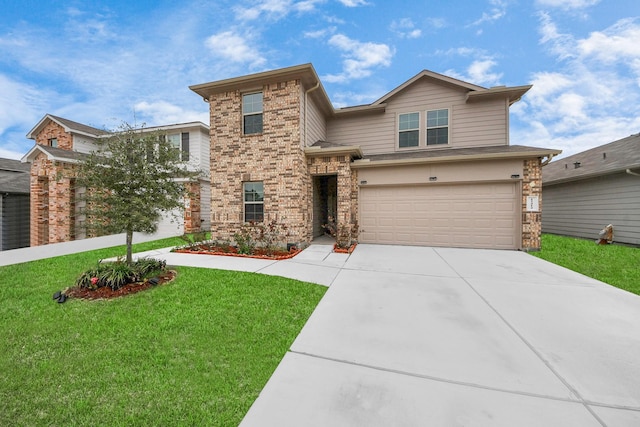 view of front of property with a garage and a front lawn