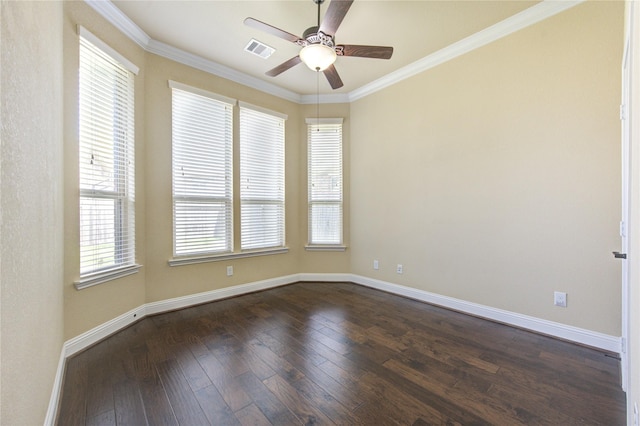 spare room featuring ornamental molding, dark hardwood / wood-style floors, and ceiling fan