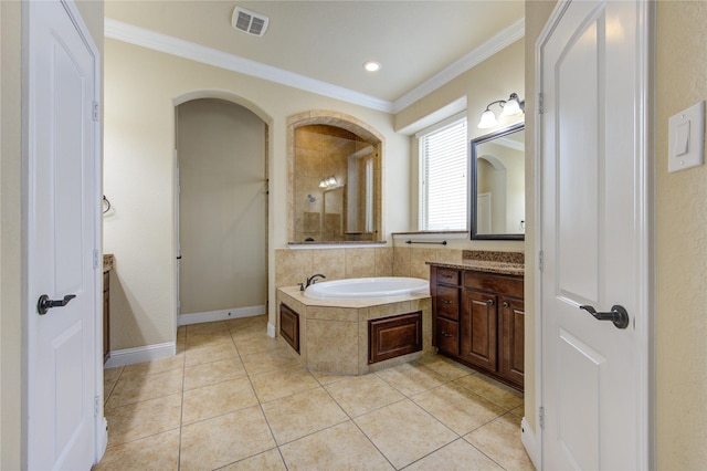 bathroom with tile patterned flooring, vanity, ornamental molding, and separate shower and tub