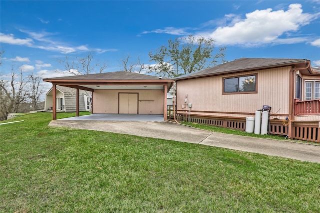 40 Pecan Cv, Coldspring, TX 77331 - ranch-style home featuring a carport and a front lawn