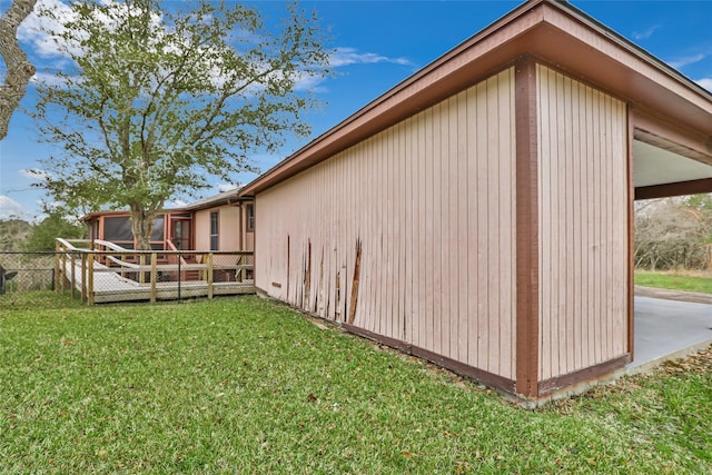40 Pecan Cv, Coldspring, TX 77331 - view of side of home featuring a yard