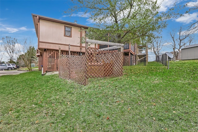 40 Pecan Cv, Coldspring, TX 77331 - back of property featuring a yard