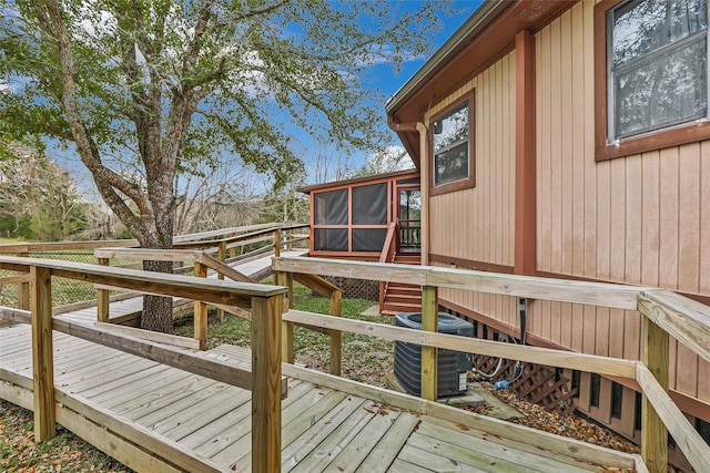 40 Pecan Cv, Coldspring, TX 77331 - wooden terrace featuring a sunroom and central AC