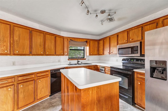 40 Pecan Cv, Coldspring, TX 77331 - kitchen with a kitchen island, sink, and black appliances