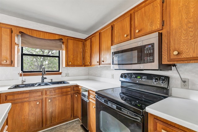 40 Pecan Cv, Coldspring, TX 77331 - kitchen featuring sink and electric range