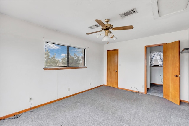 40 Pecan Cv, Coldspring, TX 77331 - unfurnished bedroom featuring a spacious closet, a closet, ceiling fan, and carpet