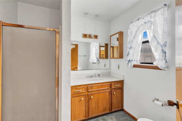 40 Pecan Cv, Coldspring, TX 77331 - bathroom with vanity and a shower with shower door