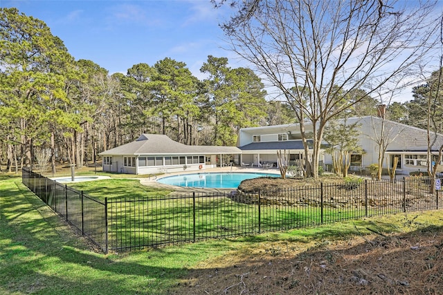 40 Pecan Cv, Coldspring, TX 77331 - view of swimming pool featuring a lawn, a sunroom, and a patio area
