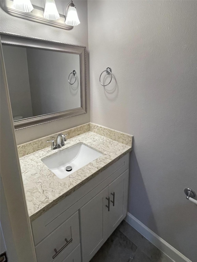 bathroom featuring tile patterned floors and vanity