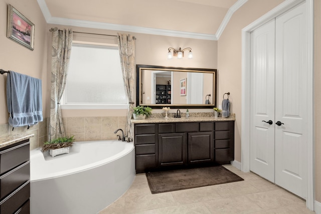 full bathroom with a bath, tile patterned flooring, vanity, and crown molding