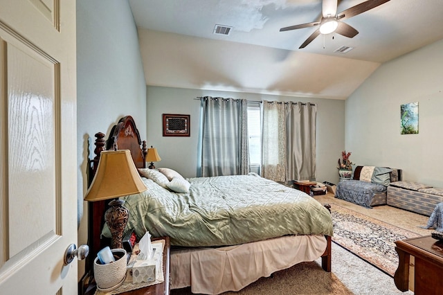 bedroom featuring ceiling fan, carpet floors, and vaulted ceiling