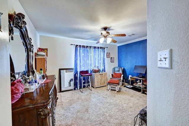 carpeted bedroom with ceiling fan