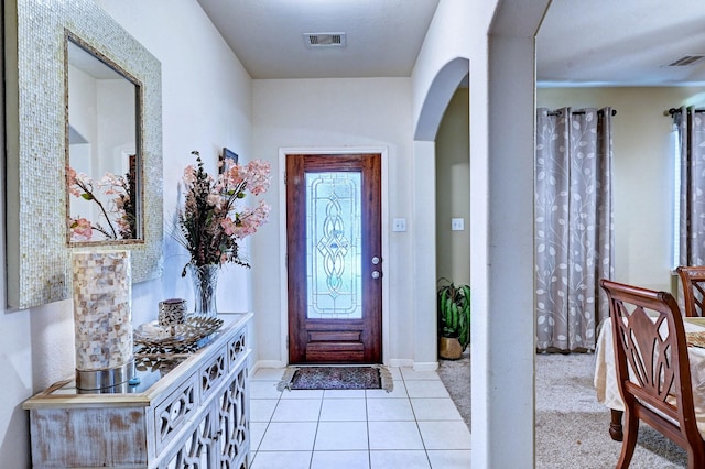 entrance foyer featuring light tile patterned flooring