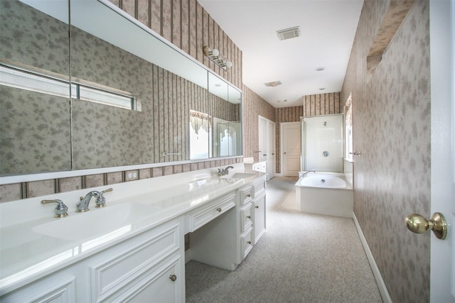 bathroom featuring a bathing tub and vanity