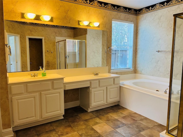 bathroom featuring vanity and shower with separate bathtub