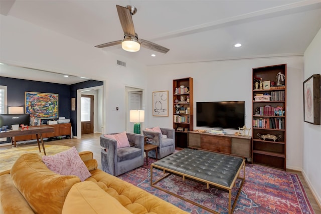 living room featuring baseboards, visible vents, ceiling fan, wood finished floors, and recessed lighting