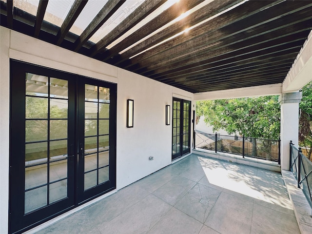 view of patio featuring french doors