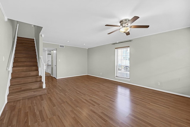 unfurnished living room featuring hardwood / wood-style flooring, ceiling fan, and ornamental molding