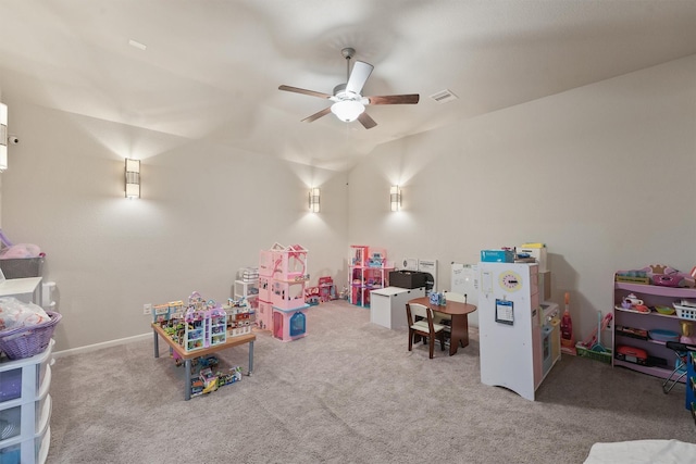 recreation room featuring lofted ceiling, carpet floors, and ceiling fan