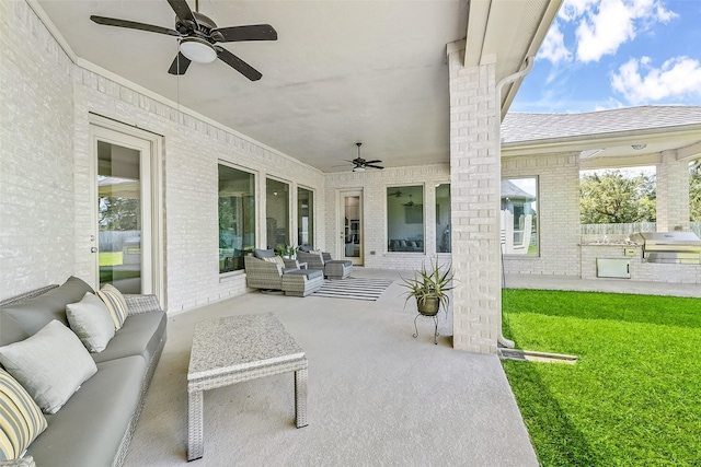 view of patio featuring an outdoor kitchen, ceiling fan, outdoor lounge area, and area for grilling