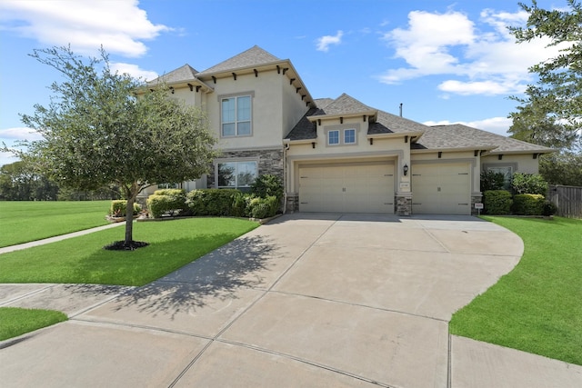 view of front of house featuring a garage and a front yard