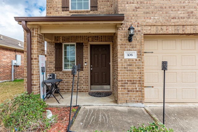 property entrance featuring a garage