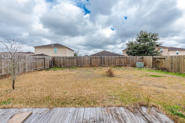 view of yard featuring a wooden deck