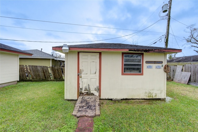 view of outdoor structure with a yard