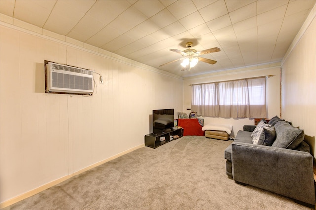 living room with crown molding, an AC wall unit, ceiling fan, and carpet