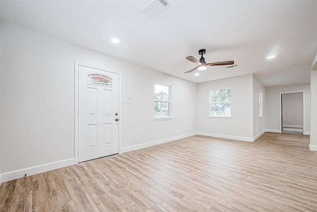 unfurnished room featuring ceiling fan and light hardwood / wood-style flooring