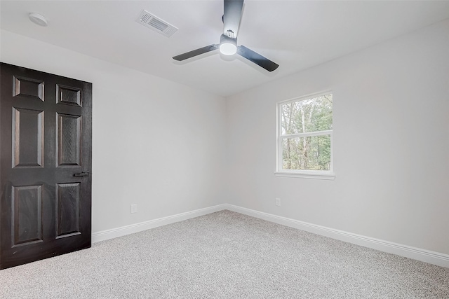 unfurnished bedroom with ceiling fan and carpet