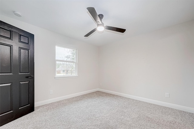 unfurnished bedroom with carpet floors and ceiling fan