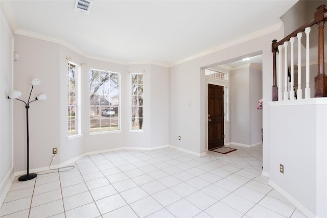 tiled empty room with ornamental molding