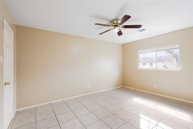 spare room with ceiling fan