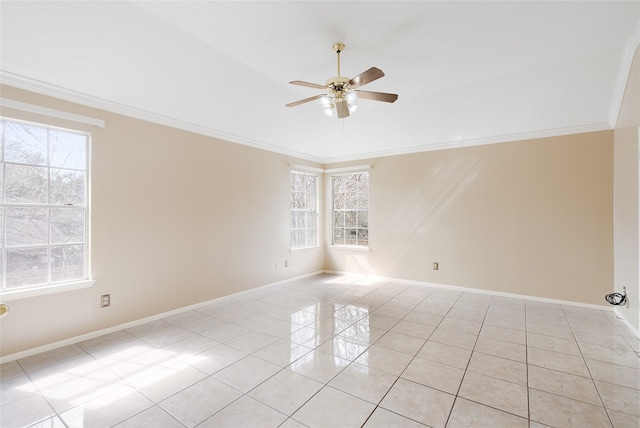 unfurnished room with crown molding, ceiling fan, and light tile patterned floors