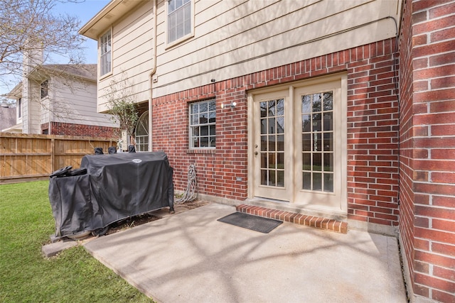 doorway to property featuring a patio and french doors