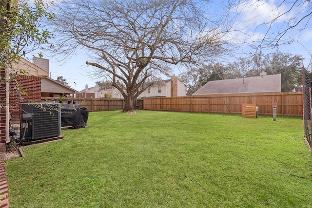 view of yard with central AC unit