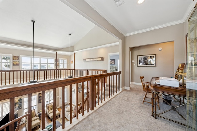 hallway with baseboards, carpet, visible vents, and crown molding