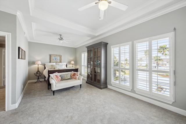 carpeted bedroom featuring ceiling fan, baseboards, and ornamental molding