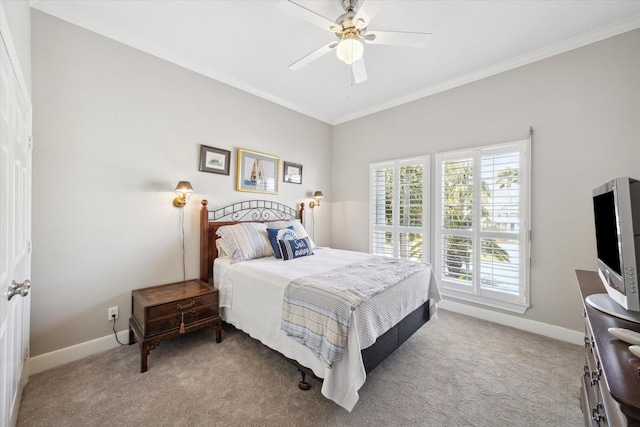 bedroom featuring ornamental molding, carpet flooring, and baseboards